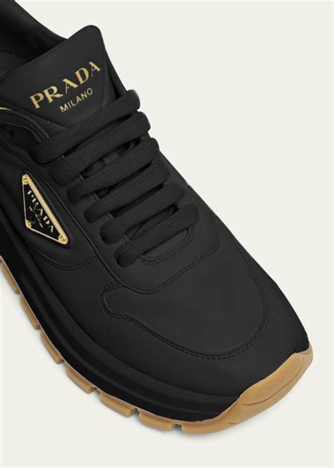 prada leather logo runner sneakers|prada knit sneakers women's.